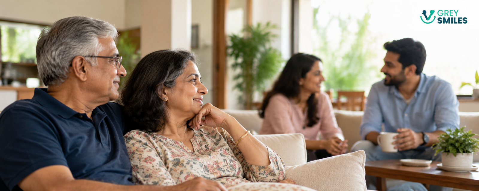 Older Indian parents spending quality time with their adult children at home