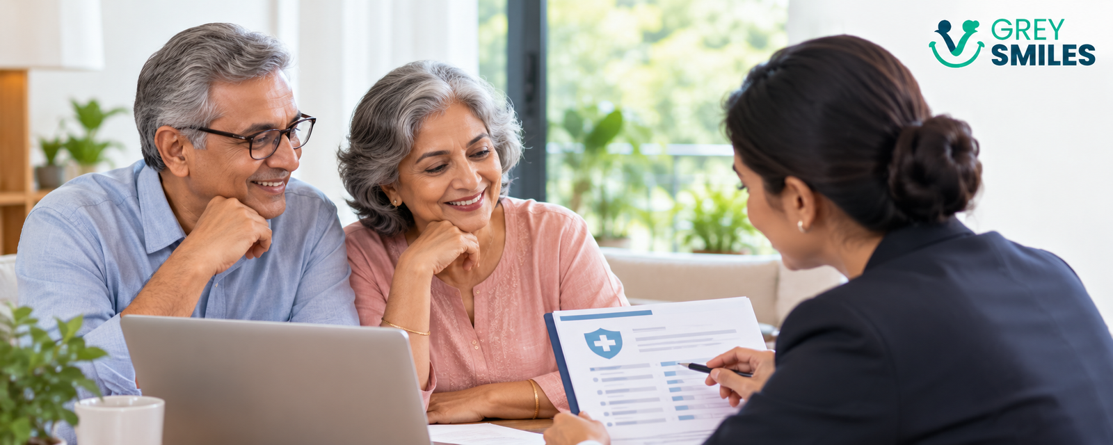 Older couple discussing health insurance and retirement planning