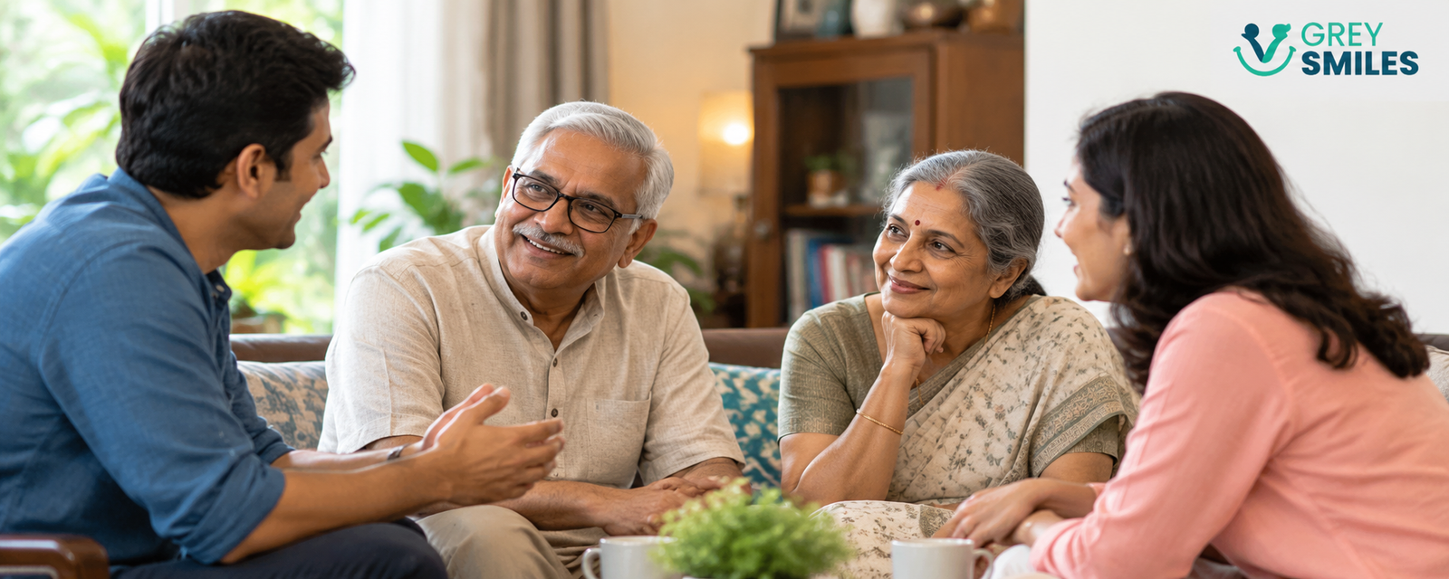 Adult children having a conversation with ageing parents at home in India